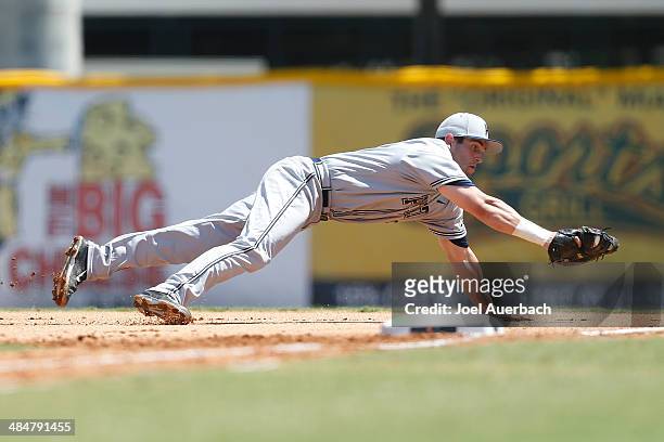 April 13: Eric Hess of the Pittsburgh Panthers makes a diving catch of the ball hit by Zack Collins of the Miami Hurricanes for the final out of the...