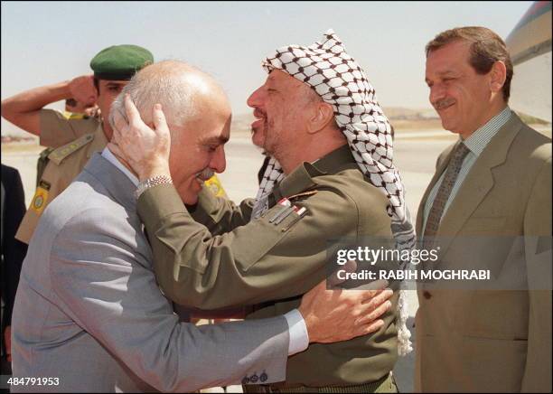 Yasser Arafat , President of Palestine Liberation Organisation shown in picture dated 20 September 1993 in Amman, kissing the head of King Hussein of...