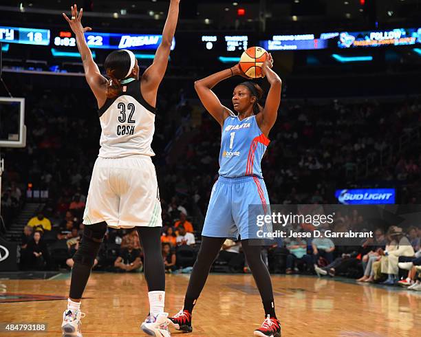 DeLisha Milton-Jones of the Atlanta Dream looks to pass the ball against the New York Liberty at Madison Square Garden on August 21, 2015 in New...