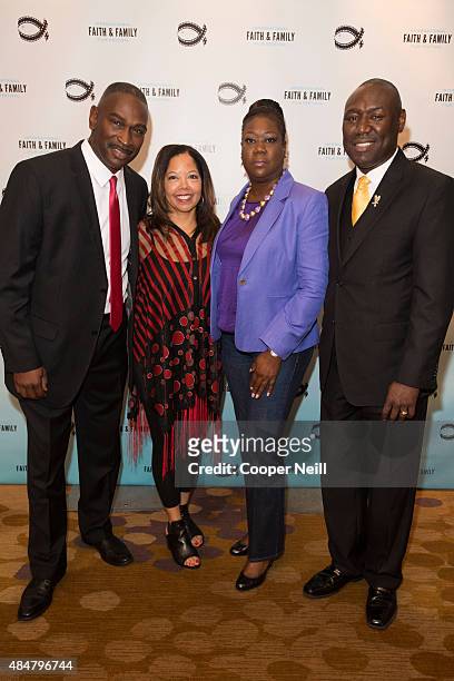 Ron Davis, Lucy McBath, Sybrina Fulton and Benjamin Crump pose for a photo before the '3 1/2 Minutes, 10 Bullets' screening during MegaFest on August...