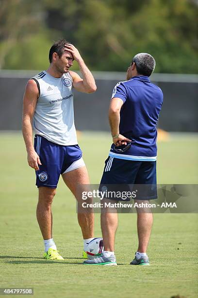 Frank Lampard talks to Director of football operations Claudio Reyna during the New York City training session on August 21, 2015 in Los Angeles,...