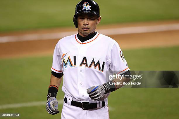 Ichiro Suzuki of the Miami Marlins walks off the field during the game against the Philadelphia Phillies at Marlins Park on August 21, 2015 in Miami,...