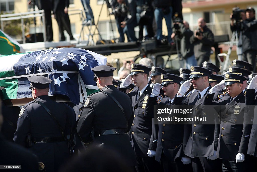 Funeral Held For NYPD Officer Injured While Investigating Fire In High Rise