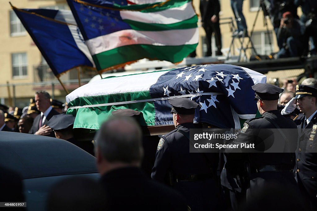 Funeral Held For NYPD Officer Injured While Investigating Fire In High Rise