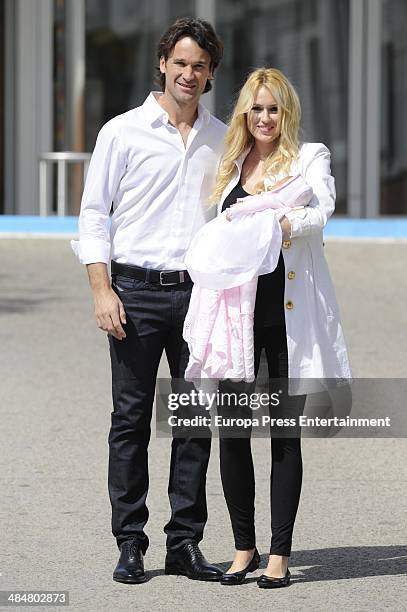 Captain of Spain's Davis Cup Carlos Moya and his wife, actress Carolina Cerezuela, with their newborn daughter Daniela Moya on April 14, 2014 in...