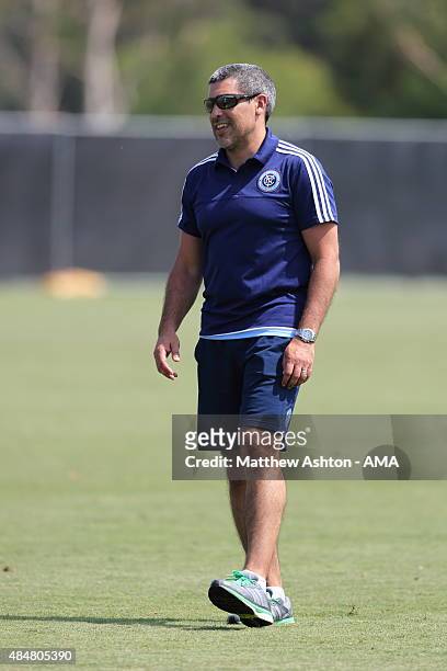 Director of football operations Claudio Reyna watches the New York City training session on August 21, 2015 in Los Angeles, California.