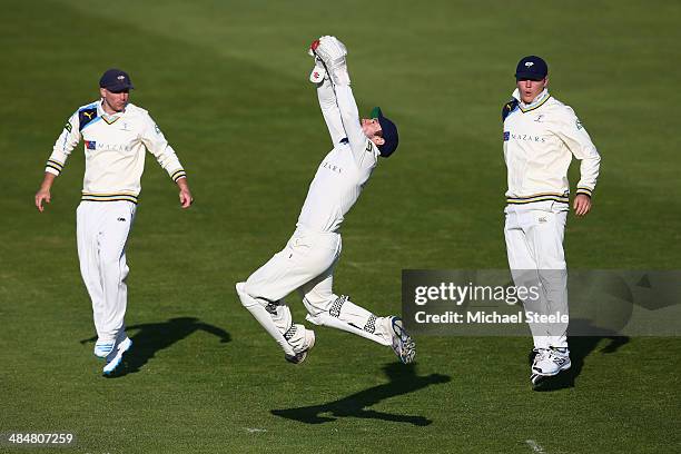 Andrew Hodd the wicketkeeper of Yorkshire leaps high to collect a delivery from Liam Plunkett as Adam Lyth and Gary Ballance look on during day two...