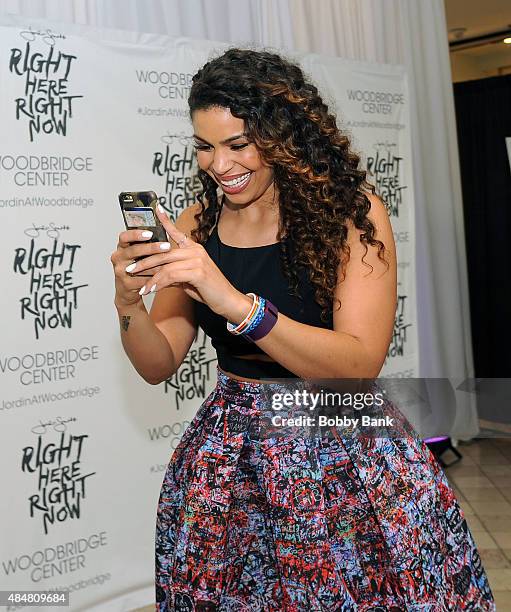 Singer Jordin Sparks attends a meet and greet for the release of her new album "Right Here, Right Now" at Woodbridge Center on August 21, 2015 in...