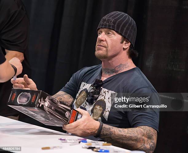 Superstar Mark William Calaway aka The Undertaker attends Wizard World Comic Con Chicago 2015 - Day 2 at Donald E. Stephens Convention Center on...