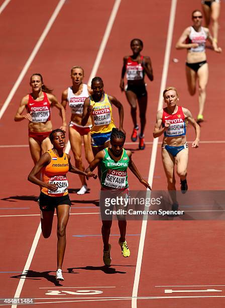 Sifan Hassan of the Netherlands and Dawit Seyaum of Ethiopia compete in the Women's 1500 metres heats during day one of the 15th IAAF World Athletics...