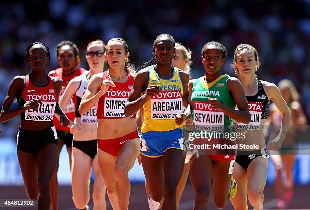 Abeba Aregawi of Sweden and Dawit Seyaum of Ethiopia compete in the Women's 1500 metres heats during day one of the 15th IAAF World Athletics...