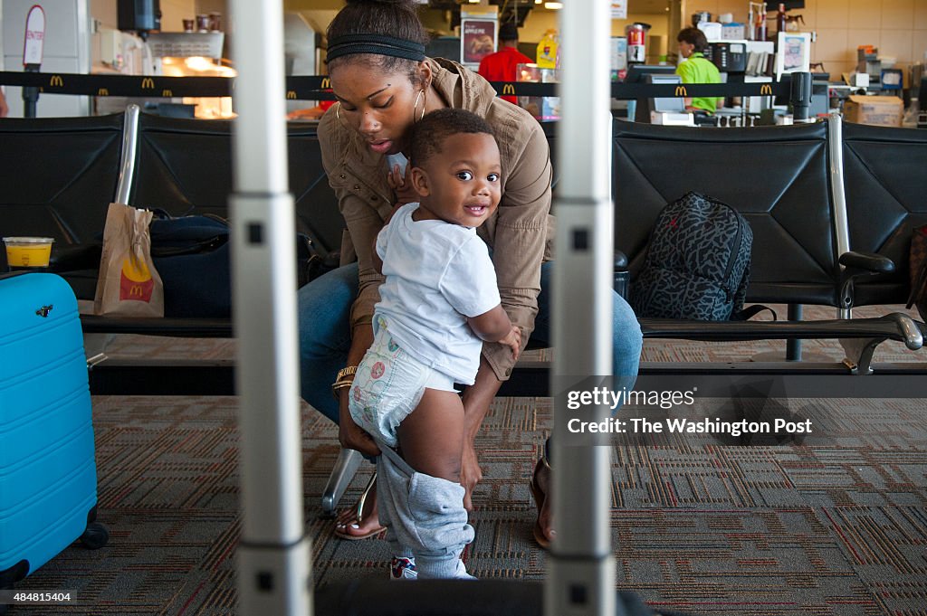 Tayler Hill, a Mystics player who takes road trips with her 1-year-old son, Mauric, and a nanny