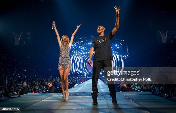 Singer-songwriter Taylor Swift and NBA player Kobe Bryant speak onstage during The 1989 World Tour Live In Los Angeles at Staples Center on August...