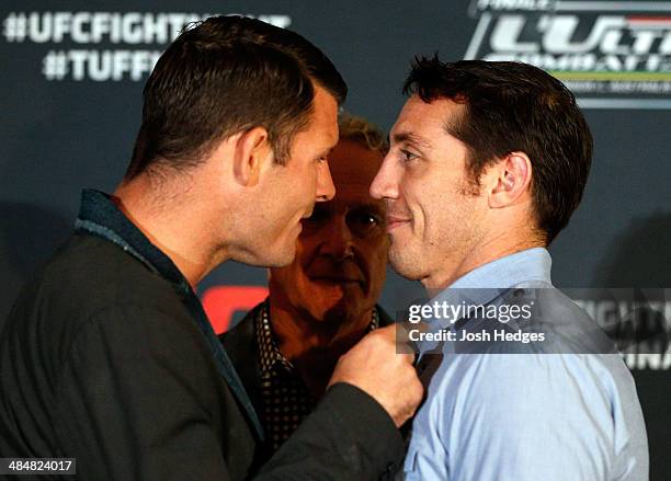 Opponents Michael Bisping and Tim Kennedy face off during the UFC Ultimate Media Day at the TRYP Quebec Hotel on April 14, 2014 in Quebec City,...