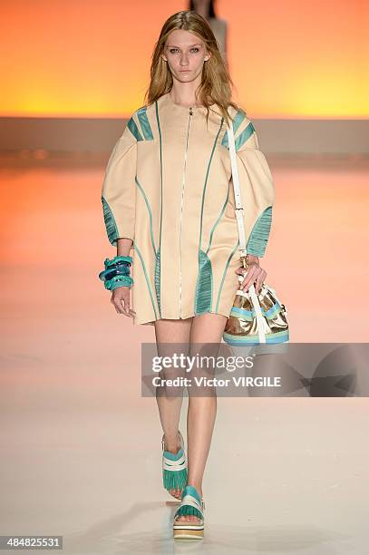 Model walks the runway at Triton show during Sao Paulo Fashion Week Summer 2014/2015 at Parque Candido Portinari on April 1, 2014 in Sao Paulo,...