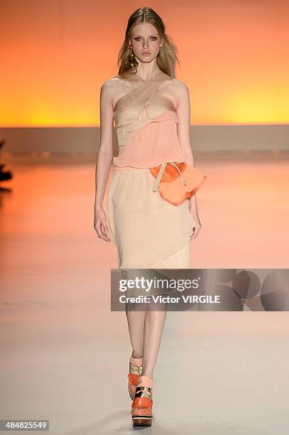 Model walks the runway at Triton show during Sao Paulo Fashion Week Summer 2014/2015 at Parque Candido Portinari on April 1, 2014 in Sao Paulo,...