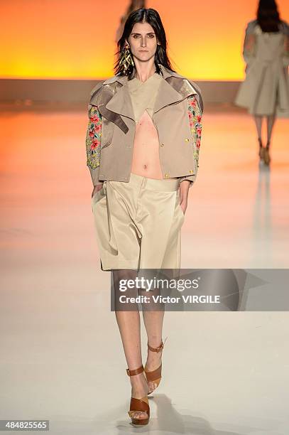 Daiane Conterato walks the runway at Triton show during Sao Paulo Fashion Week Summer 2014/2015 at Parque Candido Portinari on April 1, 2014 in Sao...