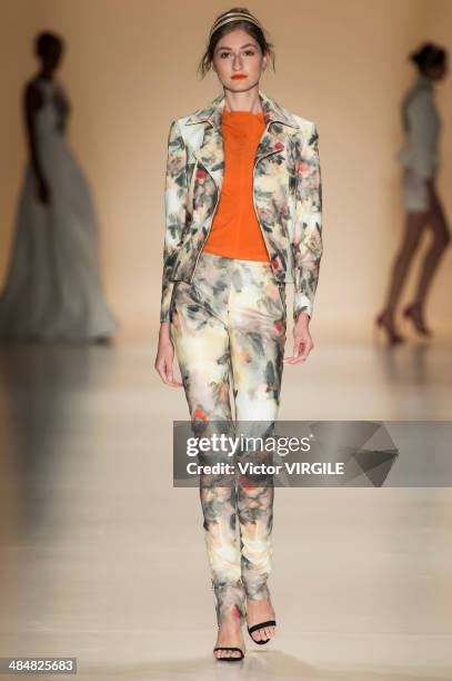 Model walks the runway at Patricia Motta show during Sao Paulo Fashion Week Summer 2014/2015 at Parque Candido Portinari on April 1, 2014 in Sao...