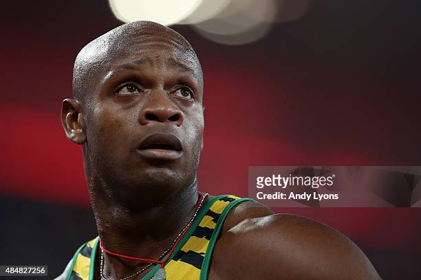 Asafa Powell of Jamaica reacts after competing in the Men's 100 metres heats during day one of the 15th IAAF World Athletics Championships Beijing...