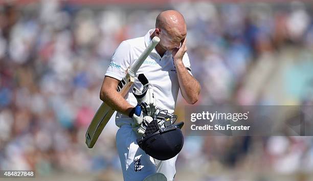 England batsman Adam Lyth reacts after being dismissed during day three of the 5th Investec Ashes Test match between England and Australia at The Kia...