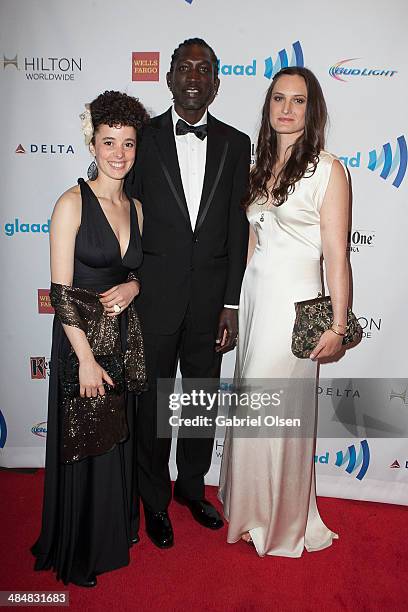 Malika Zouhali-Worrall, John "Long Jones" Abdallah Wambere and Katherine Fairfax Wright arrive for the the 25th Annual GLAAD Media Awards - Dinner...