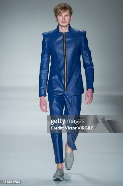 Model walks the runway during Joao Pimenta show at Sao Paulo Fashion Week Summer 2014/2015 at Parque Candido Portinari on March 31, 2014 in Sao...