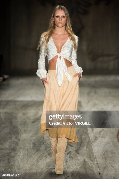 Model walks at the runway during Cavalera show during Sao Paulo Fashion Week Summer 2014/2015 at Parque Candido Portinari on March 31, 2014 in Sao...