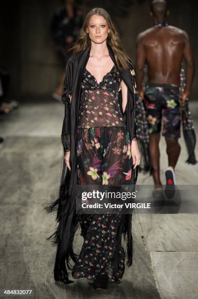 Model walks at the runway during Cavalera show during Sao Paulo Fashion Week Summer 2014/2015 at Parque Candido Portinari on March 31, 2014 in Sao...