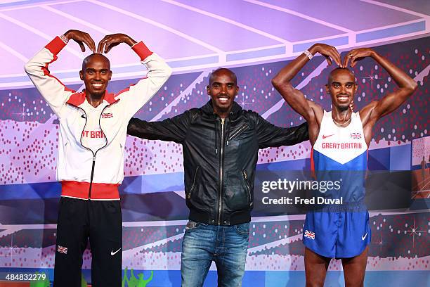 Mo Farah unveils his wax figures for London and Blackpool attractions at Madame Tussauds on April 14, 2014 in London, England.