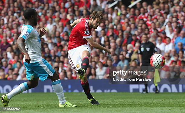 Daley Blind of Manchester United shoots during the Barclays Premier League match between Manchester United and Newcastle United at Old Trafford on...