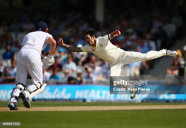 Mitchell Johnson of Australia attempts to catch Jonny Bairstow of England off his own bowling during day three of the 5th Investec Ashes Test match...
