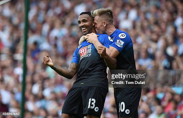 Callum Wilson of Bournemouth celebrates scoring his team's second goal with his team mate Matt Ritchie during the Barclays Premier League match...