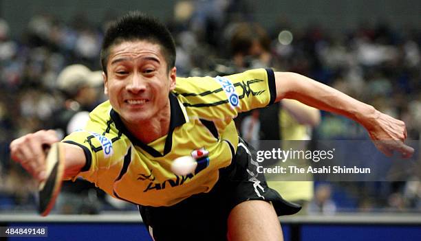 Kaii Yoshida of Japan competes in the Men's Singles 4th round match against Kim Jung-Hoon during day five of the 2009 World Table Tennis...