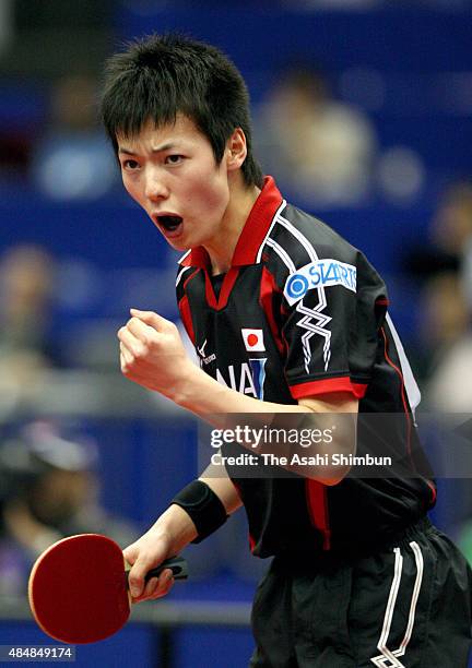 Kenta Matsudaira of Japan celebrates a point during the Men's Singles Fourth round match against Ma Lin of China during day five of the 2009 World...