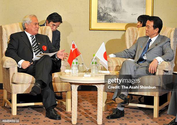 Tonga Prime Minister Feleti Sevele and Japanese Prime Minister Taro Aso talk during their bilateral meeting on the sidelines of the Pacific Islands...
