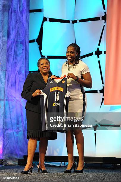 President Laurel Richie poses with Chelsea Gray after being drafted number eleven overall by the Indiana Fever during the 2014 WNBA Draft Presented...