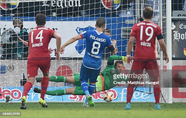 Goalkeeper Manuel Neuer of Muenchen saves a penalty of Eugen Polanski of Hoffenheim during the Bundesliga match between 1899 Hoffenheim and FC Bayern...