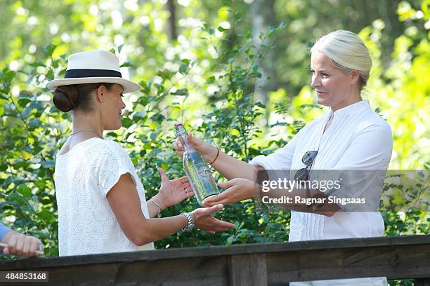 Crown Princess Victoria of Sweden and Crown Princess Mette-Marit of Norway take Part in Climate Pilgrimage on August 22, 2015 in Halden, Norway.