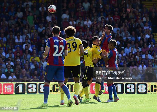 Scott Dann of Crystal Palace heads to score his team's first goal during the Barclays Premier League match between Crystal Palace and Aston Villa at...