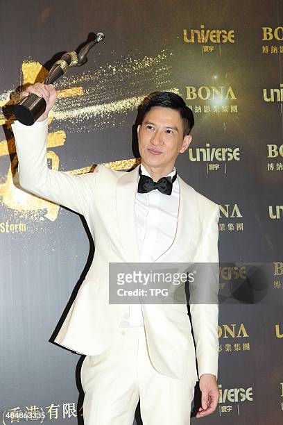 Actor Nick Cheung wins Best Actor Award for his role in "Unbeatable" at the 33rd Hong Kong Film Awards on Sunday April 13,2014 in Hong Kong,China.