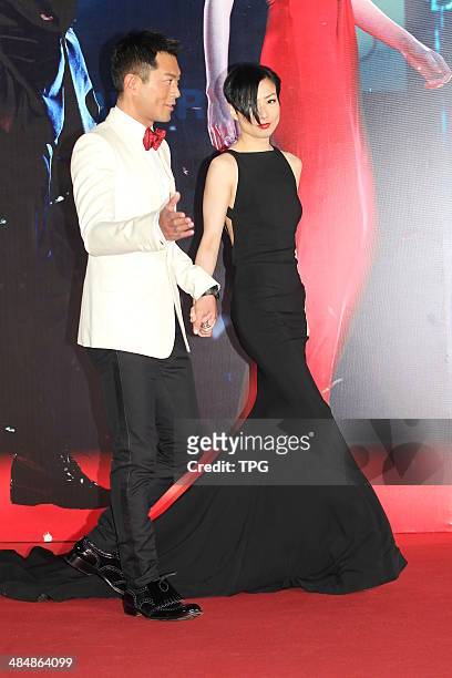Louis Koo and Sammi Cheng attend the 33rd Hong Kong Film Awards red carpet on Sunday April 13,2014 in Hong Kong,China.