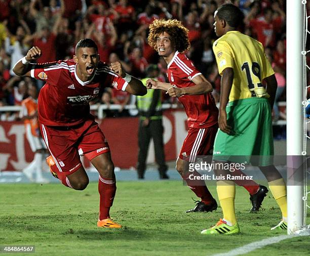 Carlos Henao player of America de Cali celebrates after scoring the opening goal during a match between America de Cali and Real Cartagena as part of...