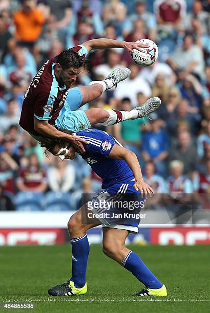 Lukas Jutkiewicz of Burnley clashes with James Tarkowski of Brentford during the Sky Bet Championship match between Burnley and Brentford at Turf...