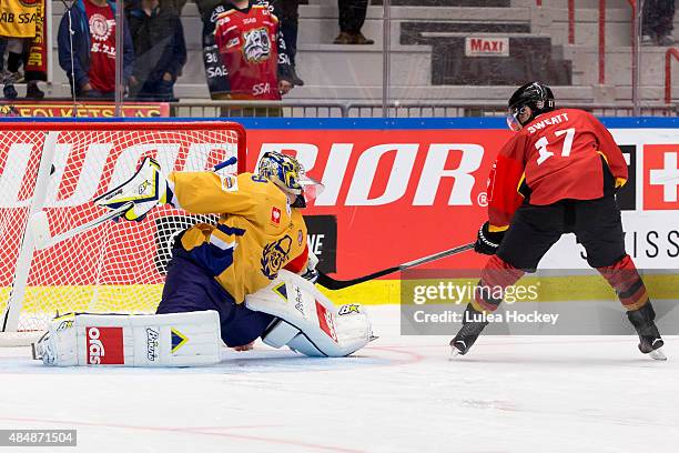 Bill Sweatt of Lulea Hockey scores the decisive goal past goaltender Rasmus Rinne of Lukko Rauma a penalty shot during the Champions Hockey League...