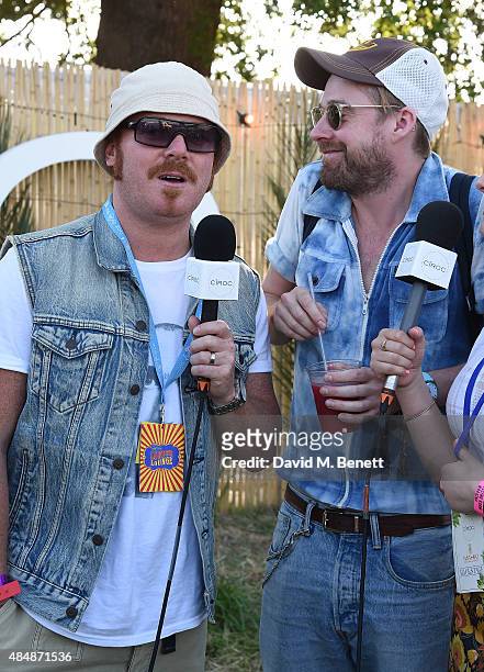 Leigh Francis and Ricky Wilson of the Kaiser Chiefs are interviewed at day one of CIROC & MAHIKI backstage at V Festival at Hylands Park on August...