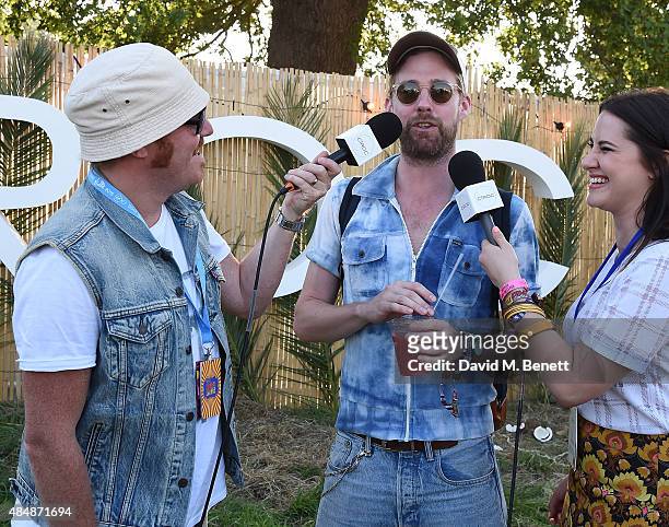 Leigh Francis and Ricky Wilson of the Kaiser Chiefs are interviewed at day one of CIROC & MAHIKI backstage at V Festival at Hylands Park on August...