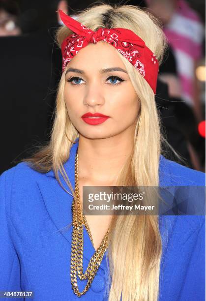 Singer Pia Mia Perez arrives at the Los Angeles premiere of 'Divergent' at Regency Bruin Theatre on March 18, 2014 in Los Angeles, California.