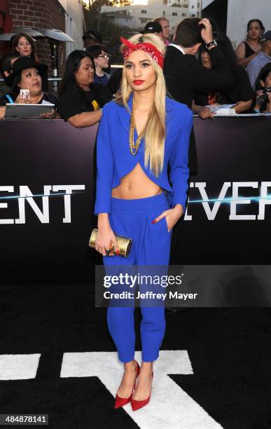 Singer Pia Mia Perez arrives at the Los Angeles premiere of 'Divergent' at Regency Bruin Theatre on March 18, 2014 in Los Angeles, California.