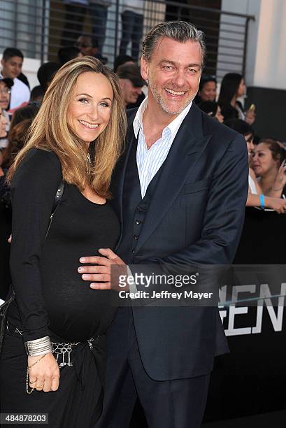 Actor Ray Stevenson and Elisabetta Caraccia arrive at the Los Angeles premiere of 'Divergent' at Regency Bruin Theatre on March 18, 2014 in Los...