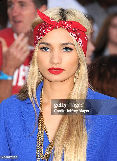 Singer Pia Mia Perez arrives at the Los Angeles premiere of 'Divergent' at Regency Bruin Theatre on March 18, 2014 in Los Angeles, California.